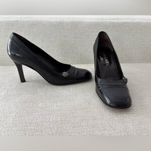 CHANEL Black Leather Camellia-Accent Heels